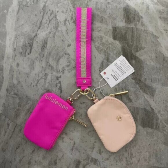 Brand new with tags Lululemon dual pouch keychain - Picture 1 of 1